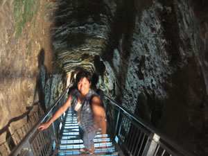 This is Toni entering into the water tunnel from the city side.  The tunnel will emerge outside the city of Megiddo at the spring of water that supplied water into the city through this tunnel.