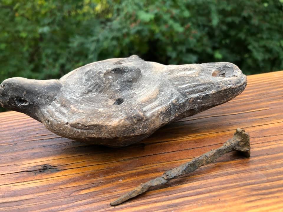 Roman Nail 25 75 AD and Decorated oil Lamp