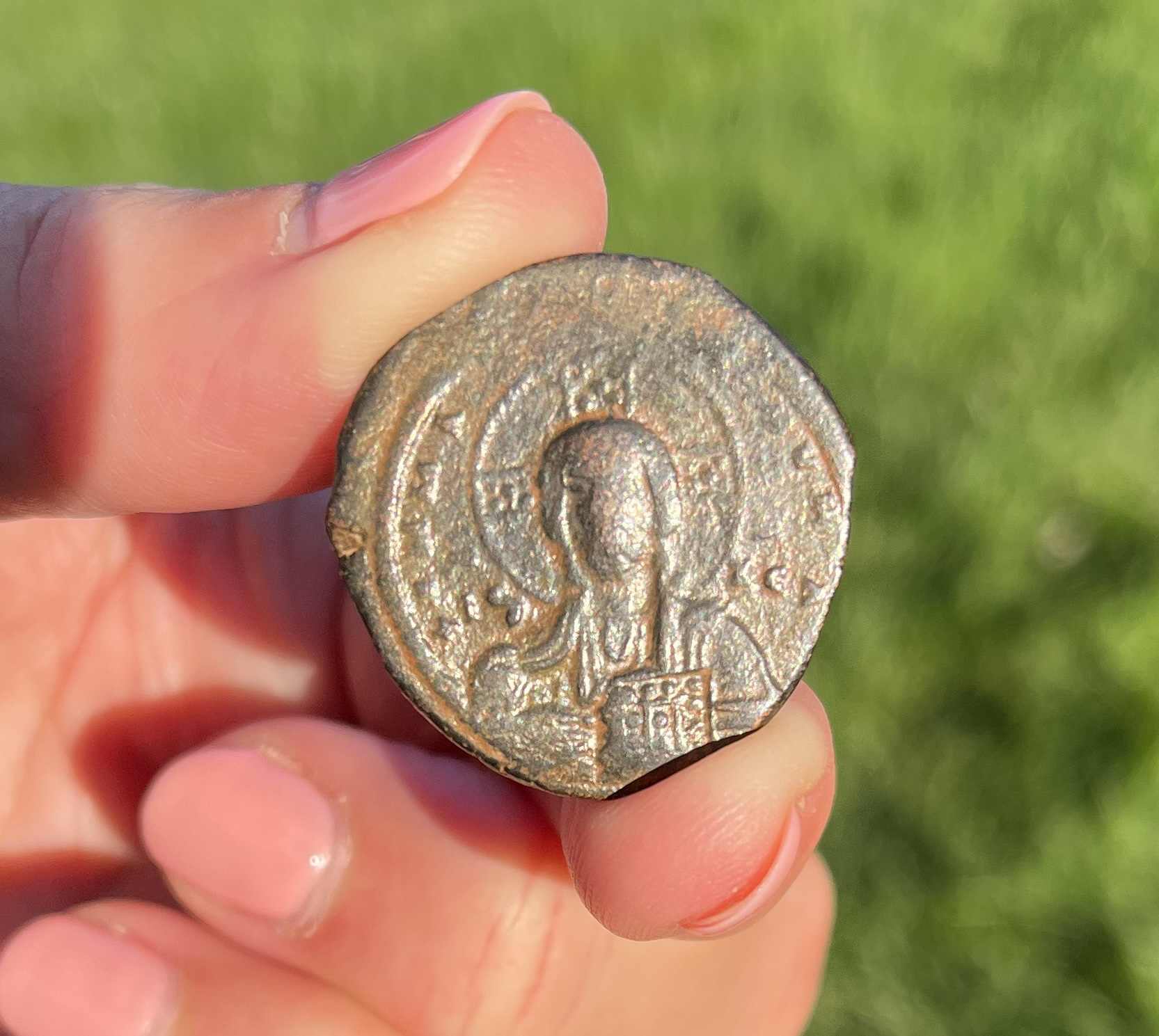 995 AD Basil II image of Christ obverse holding Gospels raised hand in benediction obv